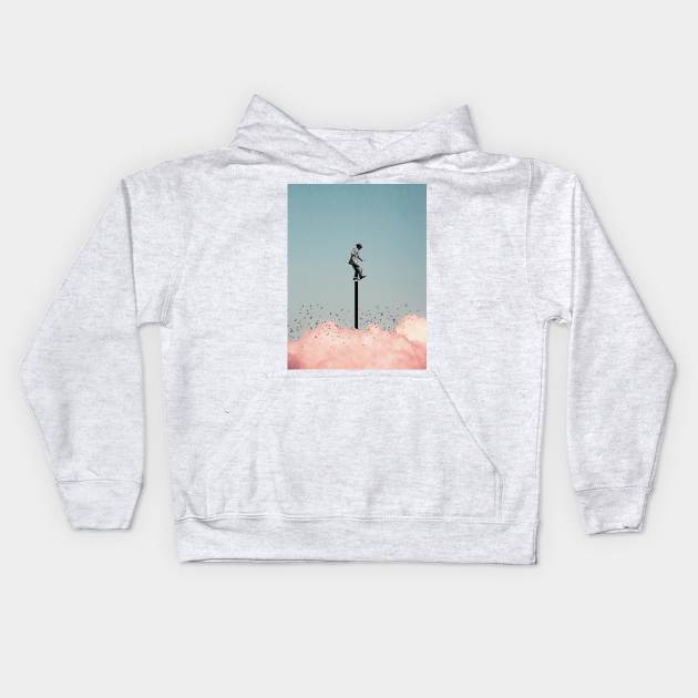 Balancing on one leg above the clouds Kids Hoodie by Underdott